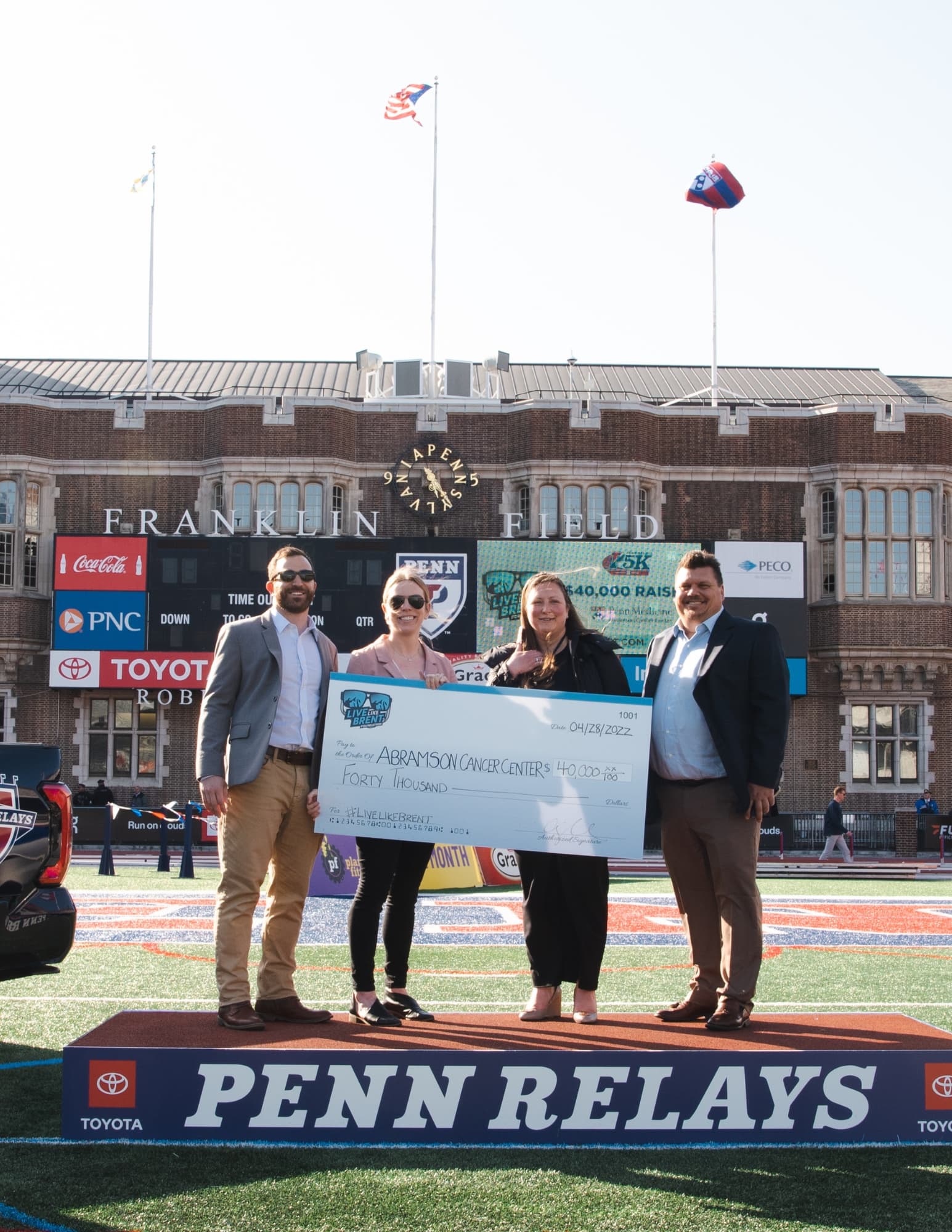 LLBF team presenting Comfort Fund check