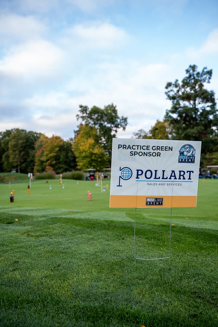 Sponsor signage on the course at the 2026 Live Like Brent Classic.